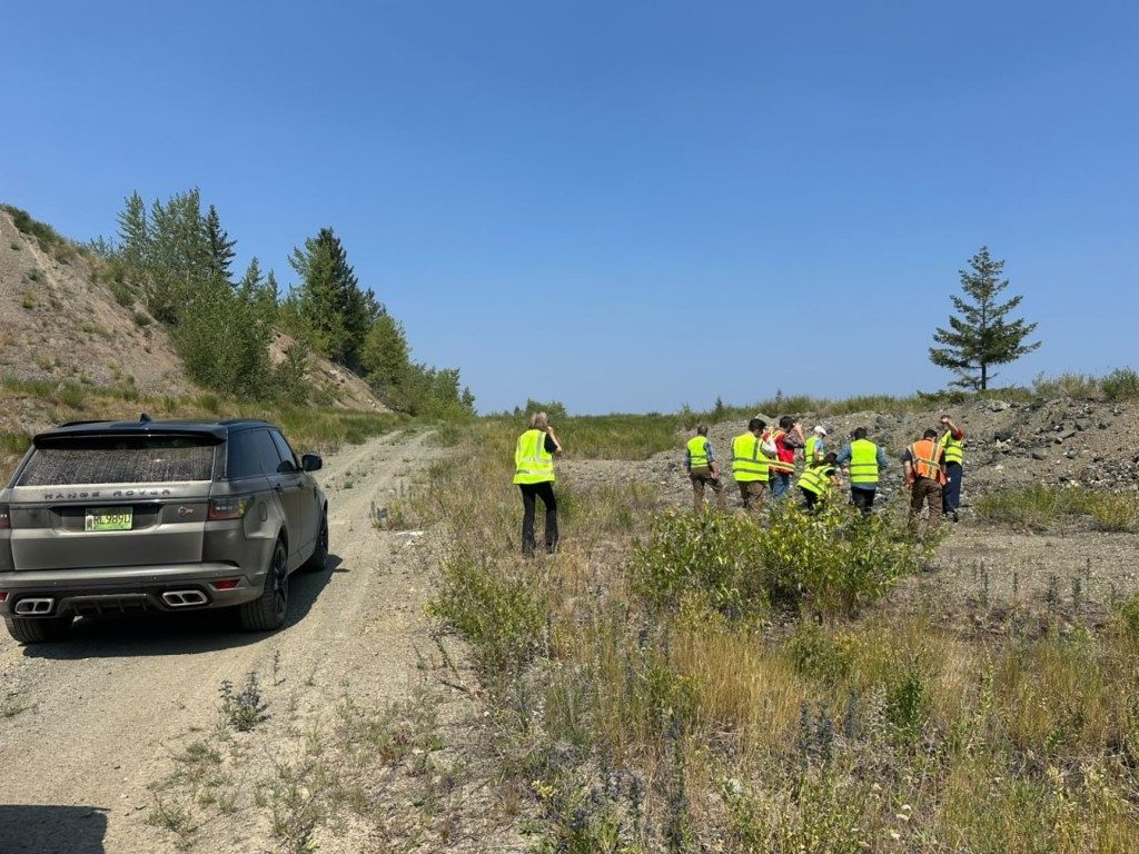 Crew and vehicle on the access road during the Kodiak MPD visit at New Craigmont
